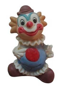 PROFOUNDLY happy porcelain clown